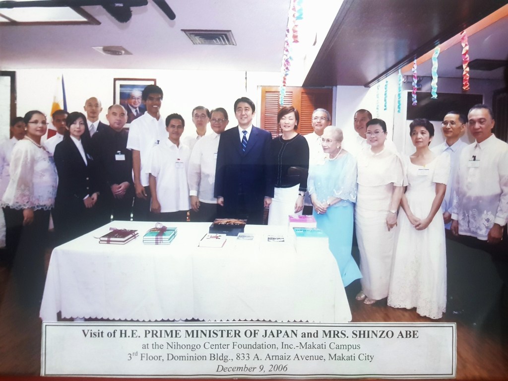Former Japanese Prime Minister Shinzo Abe and the management and faculty of Nihongo Center Foundation at Makati Philippines